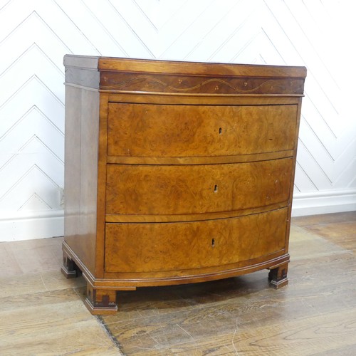 632 - A George III burr walnut and mahogany bowfront Chest of drawers, of small proportions, the bowed top... 