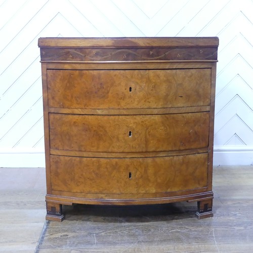 632 - A George III burr walnut and mahogany bowfront Chest of drawers, of small proportions, the bowed top... 