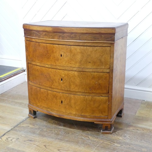 632 - A George III burr walnut and mahogany bowfront Chest of drawers, of small proportions, the bowed top... 