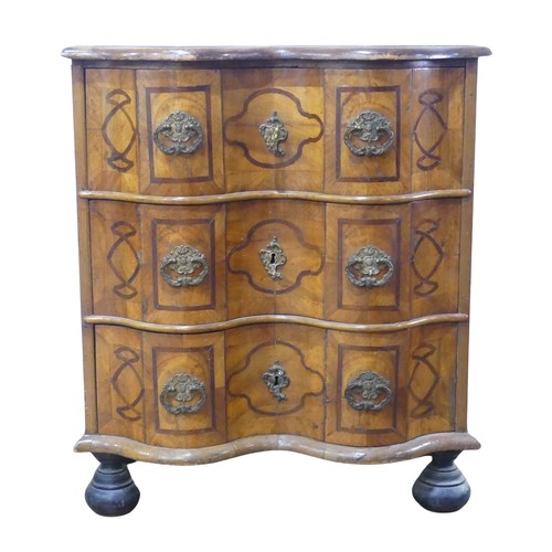 624 - A 19th century inlaid serpentine Chest of drawers, of small proportions, the moulded top over three ... 