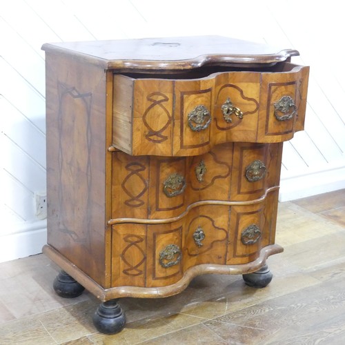 624 - A 19th century inlaid serpentine Chest of drawers, of small proportions, the moulded top over three ... 