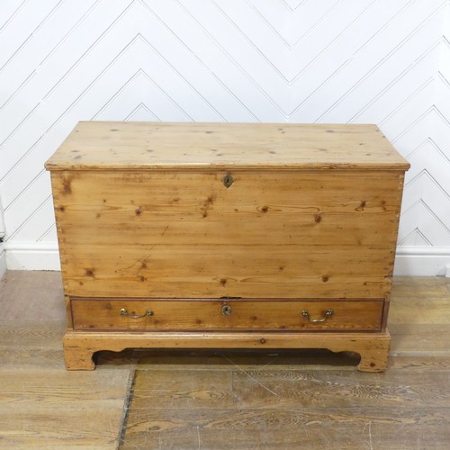 605 - A 19th century pine mule Chest, with hinged top over single drawer, raised on bracket feet, W 104 cm... 