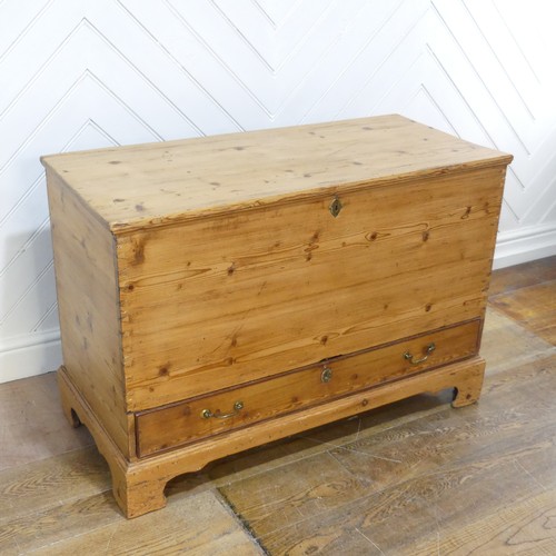 605 - A 19th century pine mule Chest, with hinged top over single drawer, raised on bracket feet, W 104 cm... 