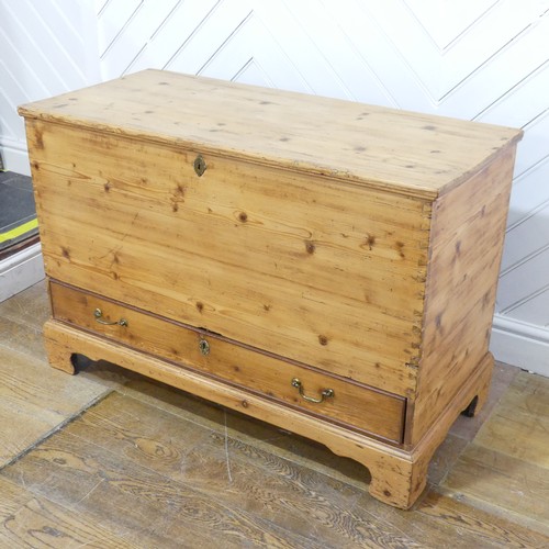 605 - A 19th century pine mule Chest, with hinged top over single drawer, raised on bracket feet, W 104 cm... 