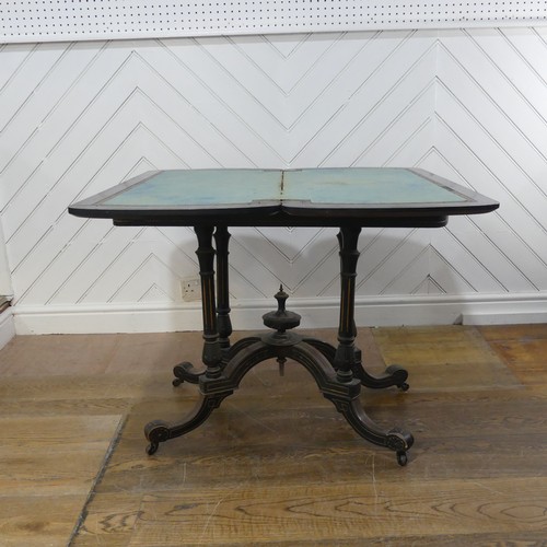 638 - An Aesthetic movement ebonised and burr walnut card Table, with rounded ends and turnover top, raise... 