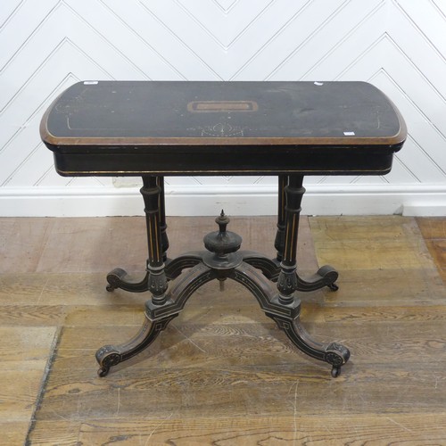 638 - An Aesthetic movement ebonised and burr walnut card Table, with rounded ends and turnover top, raise... 