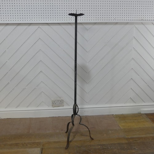 629 - An antique wrought iron ecclesiastical style candle Holder, W 28 cm x H 119 cm x D 28 cm.... 