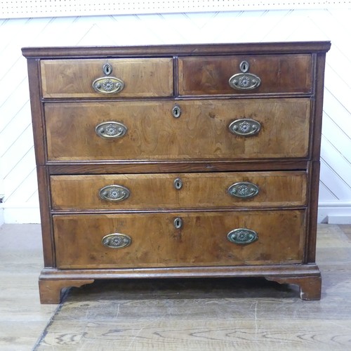 636 - A 19th century oak Chest of drawers, raised on bracket feet, splits into two pieces for ease of tran... 