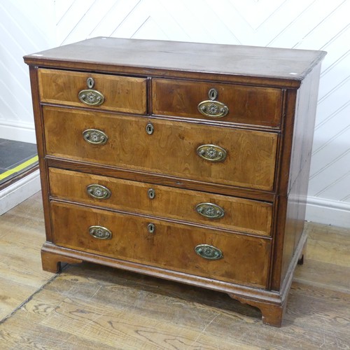 636 - A 19th century oak Chest of drawers, raised on bracket feet, splits into two pieces for ease of tran... 