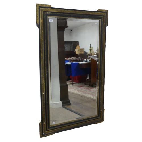 621 - A large antique 19th century style ebonised and gilt painted wall Mirror, the frame with carved gilt... 