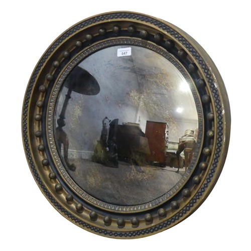 647 - A 19th century Regency style circular convex wall Mirror, the moulded frame applied with carvings an... 