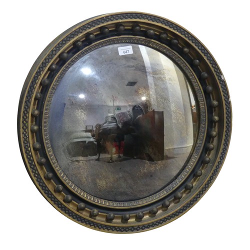 647 - A 19th century Regency style circular convex wall Mirror, the moulded frame applied with carvings an... 