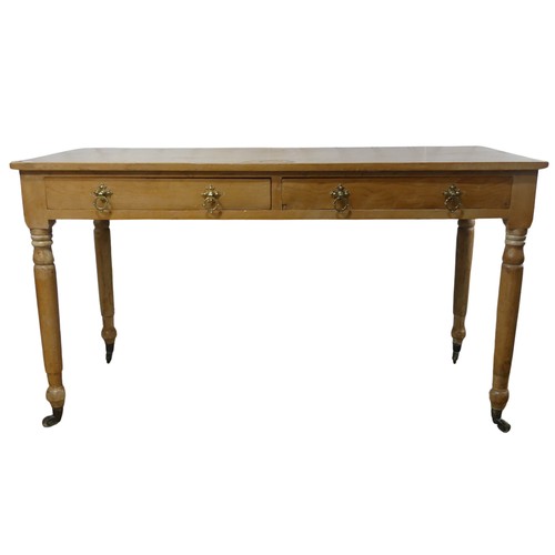 654 - A late 19th / early 20th century pine Desk, the rectangular top over two frieze drawers mounted with... 