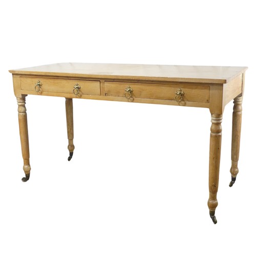 654 - A late 19th / early 20th century pine Desk, the rectangular top over two frieze drawers mounted with... 