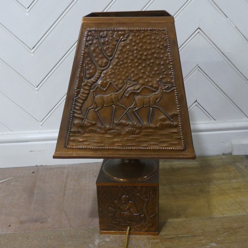 619 - A 20th century African style copper table Lamp, W 31 cm x H 55 cm x D 31 cm, together with an Africa... 