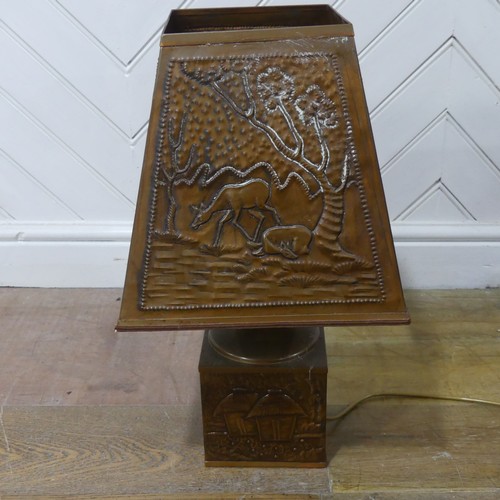 619 - A 20th century African style copper table Lamp, W 31 cm x H 55 cm x D 31 cm, together with an Africa... 