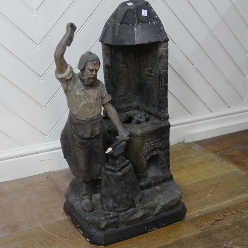 618 - An early 20th century Lamp in the form of Blacksmith, signed ''Aug Ott 1905'' (possibly August Otto)... 