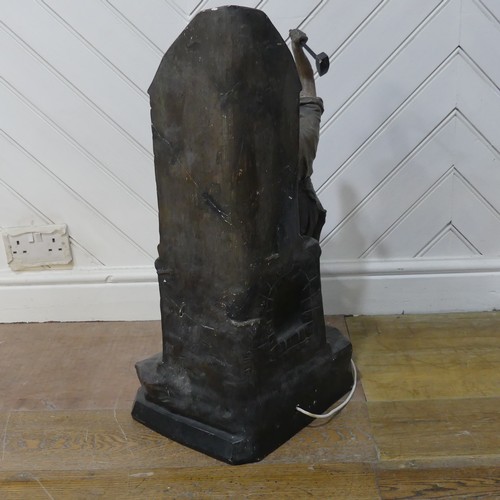 618 - An early 20th century Lamp in the form of Blacksmith, signed ''Aug Ott 1905'' (possibly August Otto)... 