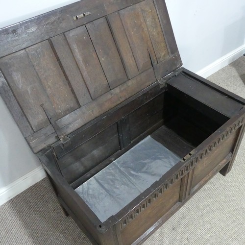 679 - An 18th century paneled oak Coffer, of small proportions, W 97 cm x H 57 cm x D 52 cm.... 