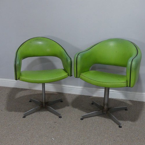 687 - A near pair of Retro mid-20th century swivel barbers Chairs, upholstered in green leatherette and ra... 