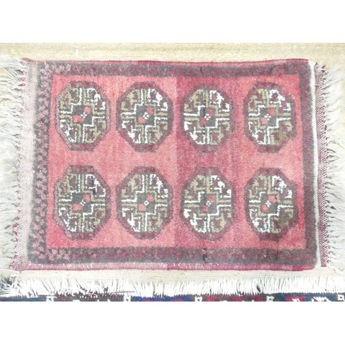 702 - Tribal Rugs: a Kazak rug, blue, red and cream geometric design, 100% wool, fringes and pile slightly... 