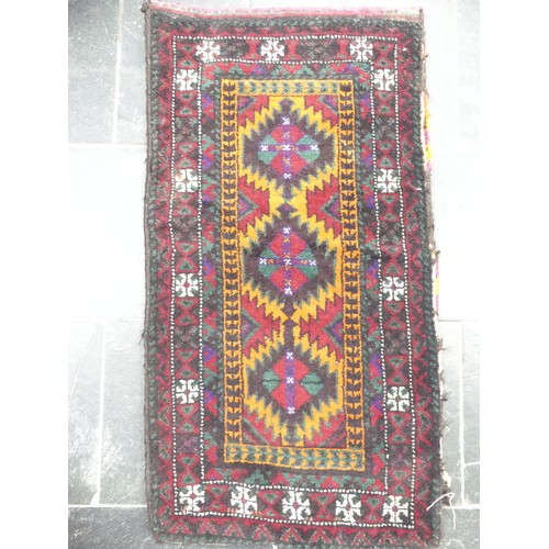 703 - Tribal Rugs: a buff ground Bokhara rug, wool pile on a cotton base, needs cleaning otherwise in good... 