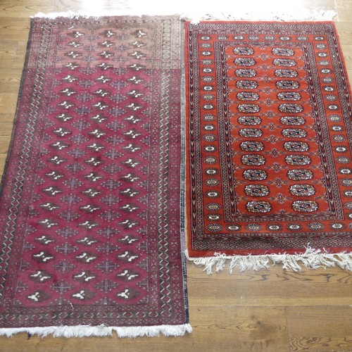 701 - Tribal Rugs: a madder ground Bokhara rug, finely knotted wool pile on a cotton base, 160cm x 97cm, t... 