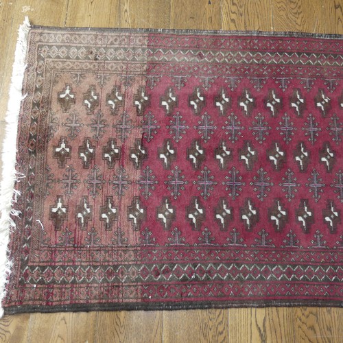 701 - Tribal Rugs: a madder ground Bokhara rug, finely knotted wool pile on a cotton base, 160cm x 97cm, t... 