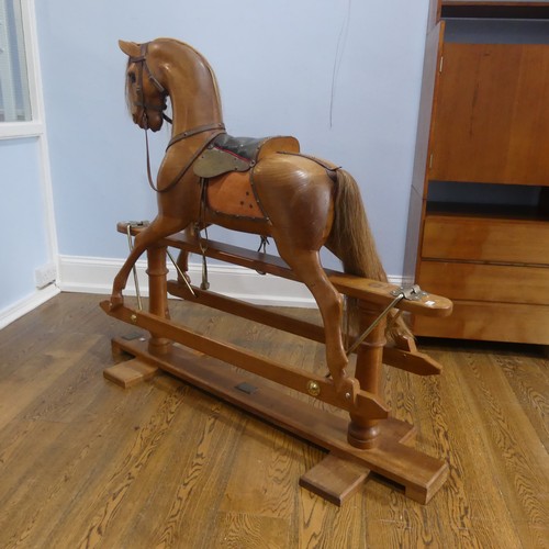 660 - A Stevenson Brothers large Rocking Horse, known as Rockabilly, 1994 in a natural wood finish, with a... 