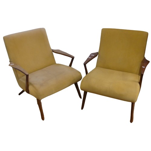 676 - A pair of mid-20th century teak G-plan easy Armchairs, probably Ib Kofod Larsen for G-Plan for the '... 