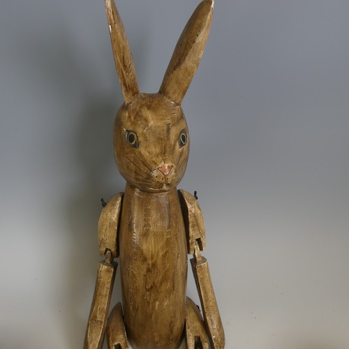 608 - An antique carved articulating Doll/Figure in the form of a Rabbit, with moving joints and painted d... 