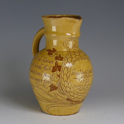 28 - Edwin Beer Fishley (1836-1912) a Fremington pottery Harvest Jug, decorated in yellow slip with sgraf... 