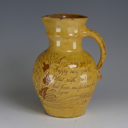 28 - Edwin Beer Fishley (1836-1912) a Fremington pottery Harvest Jug, decorated in yellow slip with sgraf... 