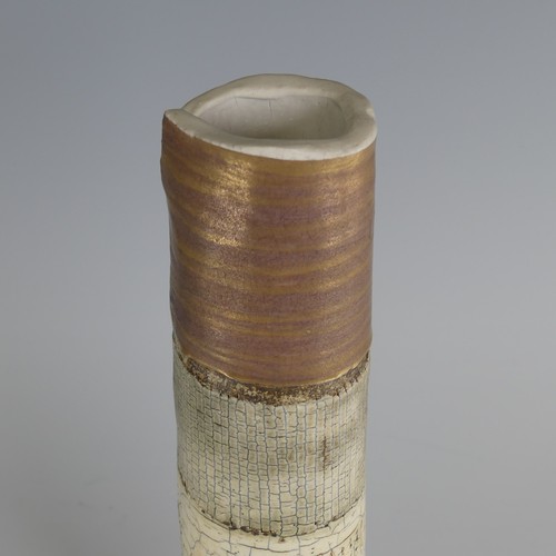 84 - Laurel Keeley (b. 1952) a stoneware and raku cylindrical Vase, of curled slab form, with gilded top ... 