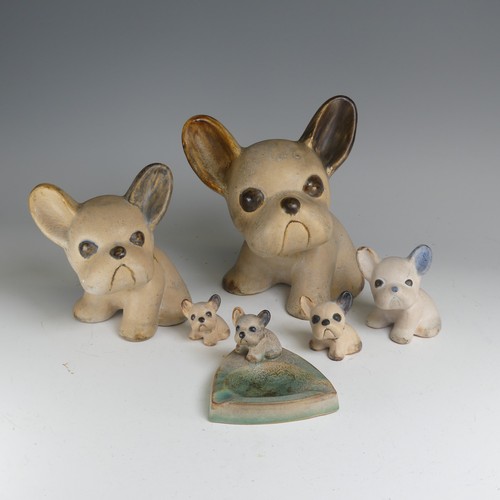 94 - A small quantity of Denby 'Byngo' Dogs, to comprise one large figure, four smaller and a figural ash... 