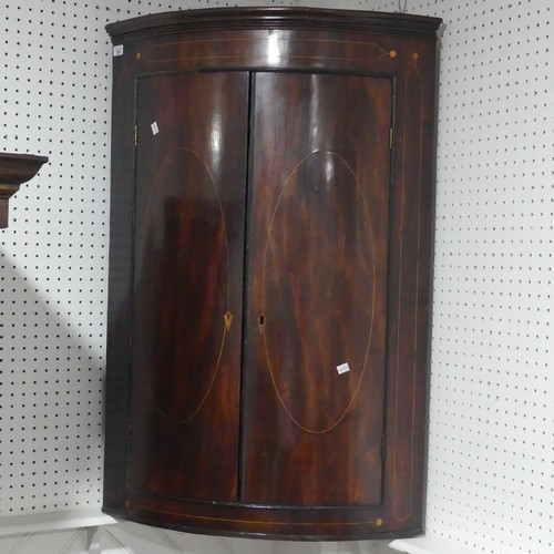 596 - A Georgian style mahogany and inlaid corner Cupboard, W 74 cm x H 108 cm x D 50.5 cm.... 