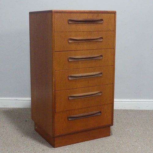 726 - A mid-20th century teak G-Plan Fresco tallboy Chest of drawers, complete with six drawers raised on ... 