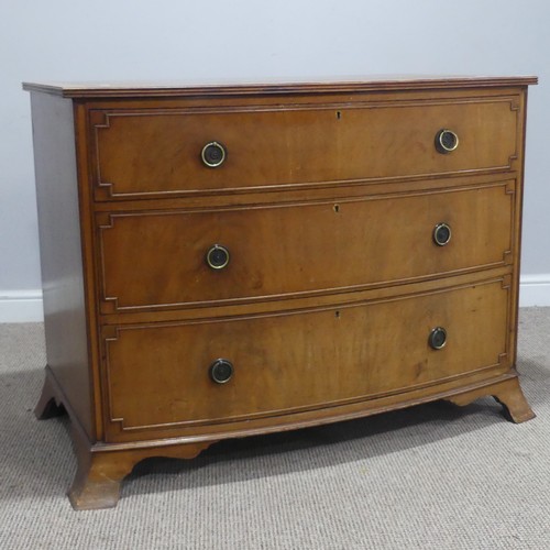 663 - A Georgian style 20th century mahogany bow-front Chest of drawers, the bowed top with banded edges, ... 