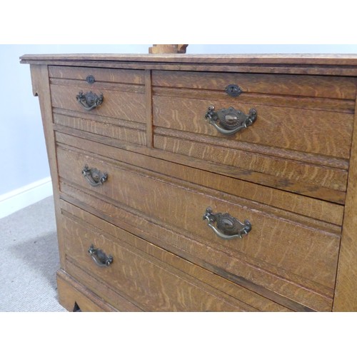 599 - A Shapland and Petter of Barnstaple  Arts and Crafts oak dressing Chest, with pierced designs, the r... 