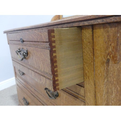 599 - A Shapland and Petter of Barnstaple  Arts and Crafts oak dressing Chest, with pierced designs, the r... 