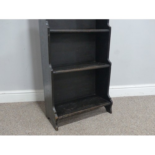 668 - A 20th century ebonised oak waterfall Bookcase, W 45.5 cm x H 113 cm x D 23 cm.