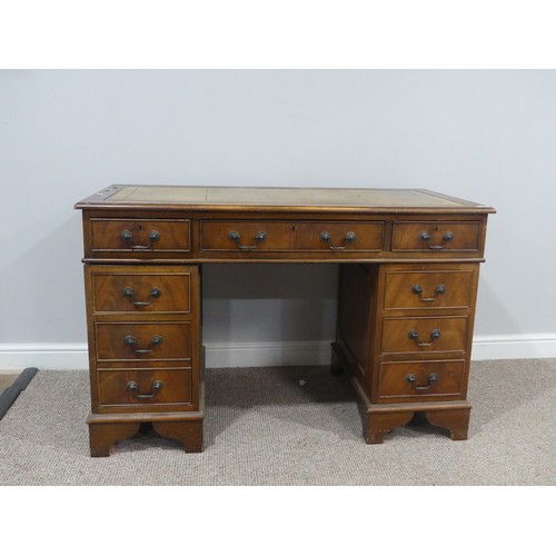 637 - An early 20th century mahogany pedestal Desk, the three sectioned gilt tooled leather writing surfac... 