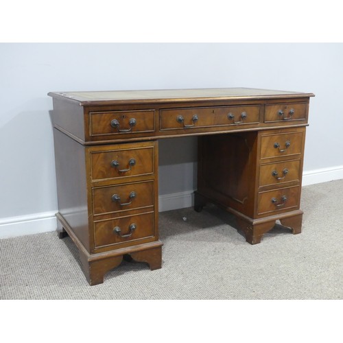 637 - An early 20th century mahogany pedestal Desk, the three sectioned gilt tooled leather writing surfac... 