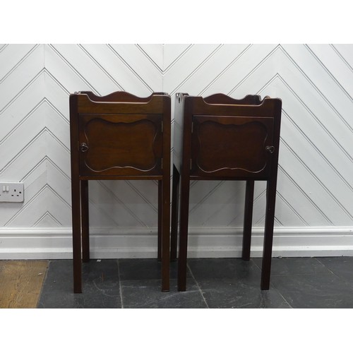 592 - A pair of George III style mahogany bedside Tables/pot Cupboards, square moulded and pierced tray to... 