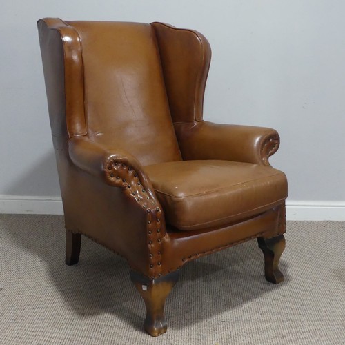 686 - A John Lewis 'Compton' tan leather wingback Armchair, with scrolled arms, W 90 cm x H 108 cm x D 80 ... 