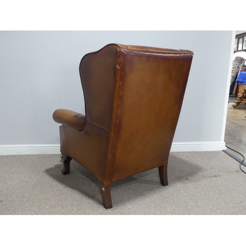 686 - A John Lewis 'Compton' tan leather wingback Armchair, with scrolled arms, W 90 cm x H 108 cm x D 80 ... 