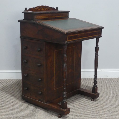 678 - A late 19th century oak and inlaid Davenport, the sloped hinged top inset with leather writing surfa... 