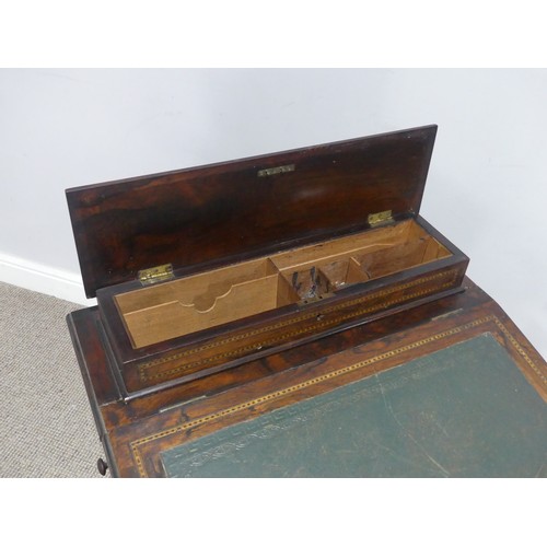 678 - A late 19th century oak and inlaid Davenport, the sloped hinged top inset with leather writing surfa... 