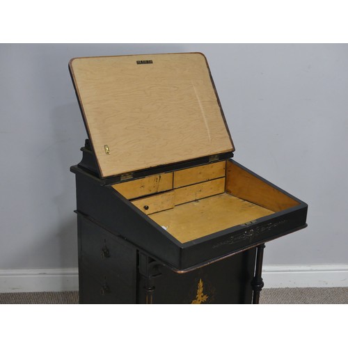 536 - An ebonised Victorian Davenport, the top with three quarter brass gallery and red painted writing su... 