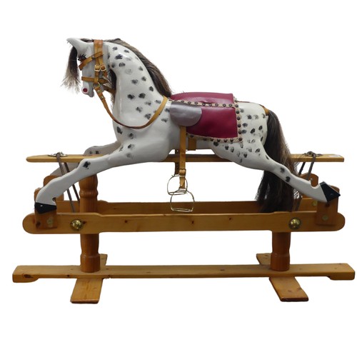 518 - A 20th century carved and painted Rocking Horse, with horse hair mane and tail, W 121 cm x H 84 cm x... 